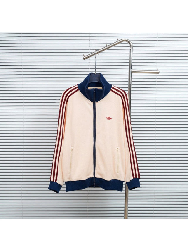 Campera Adidas crema con detalles azul marino