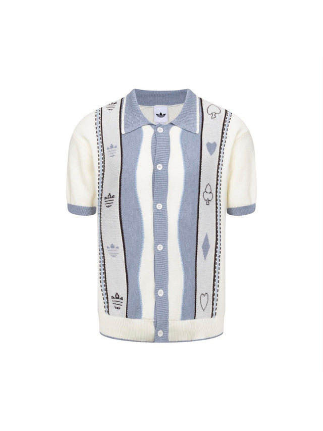 Remera deportiva Adidas crema con rayas celestes