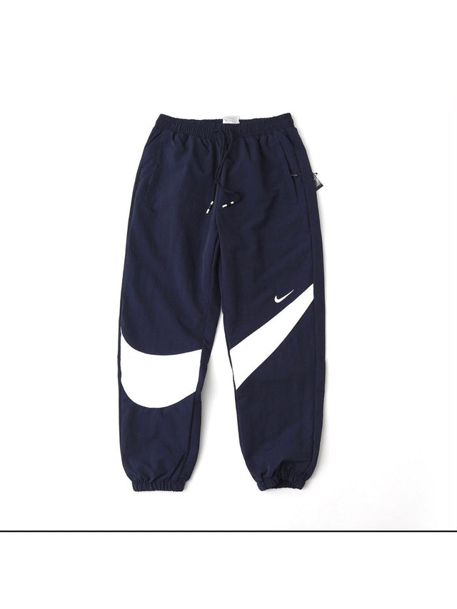 Pantal�n Nike azul marino con swoosh grande