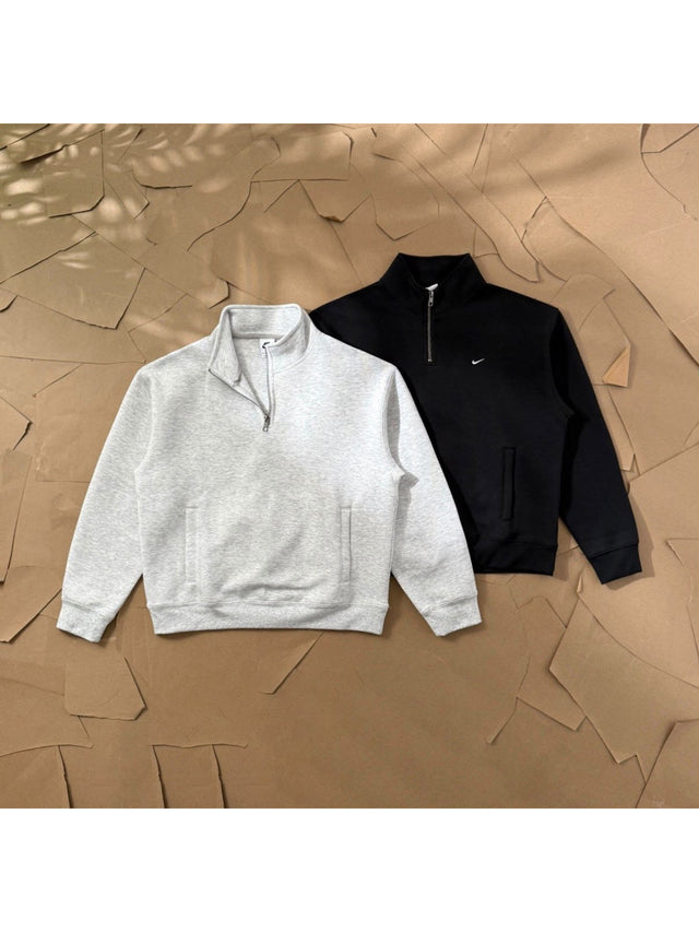 Buzo Nike de medio cierre blanco o negro