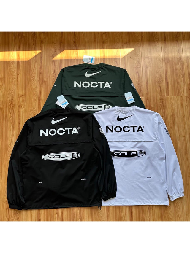 Camperas Nike Nocta en verde, negro y blanco