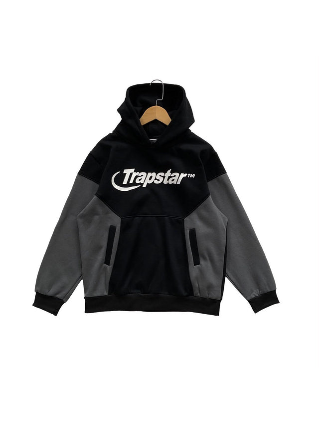 Buzo Trapstar bicolor negro y gris