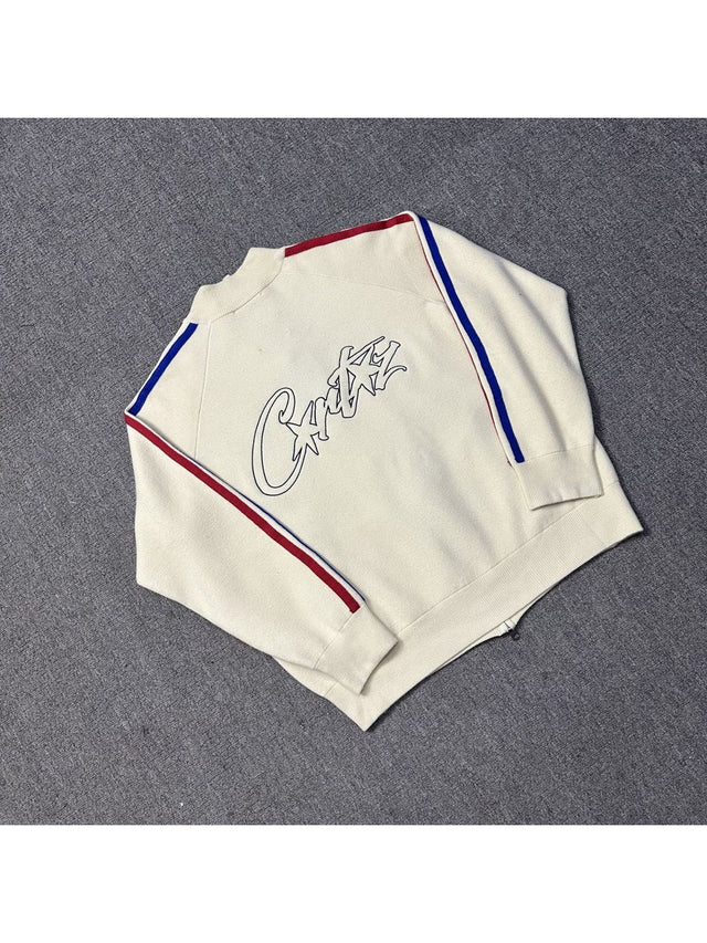 Campera crema con l�neas rojas y azules | Corteiz