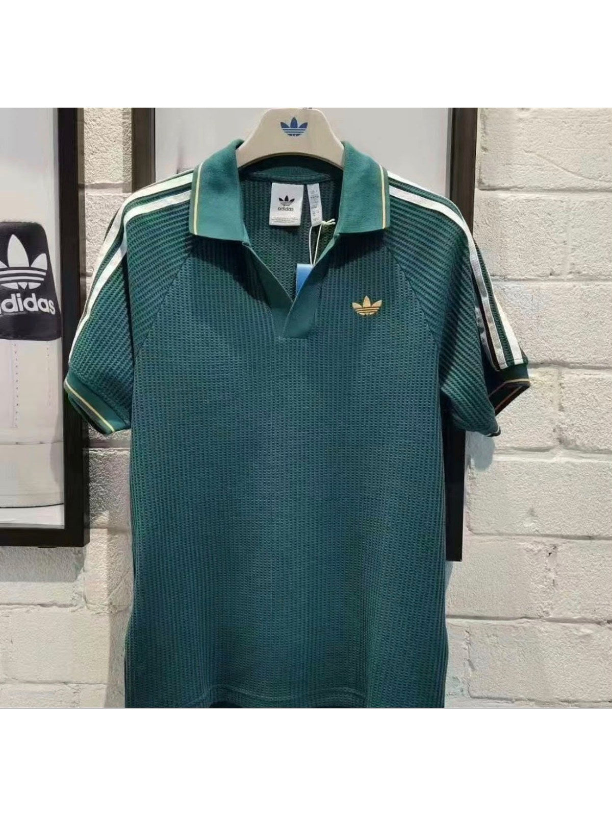 Remera polo Adidas verde