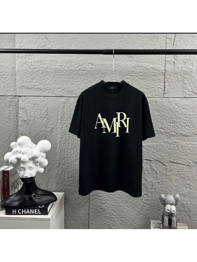 Remera Amiri negra con logo dorado