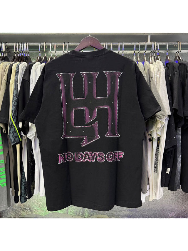 Remera Life Hustle figura violeta negra