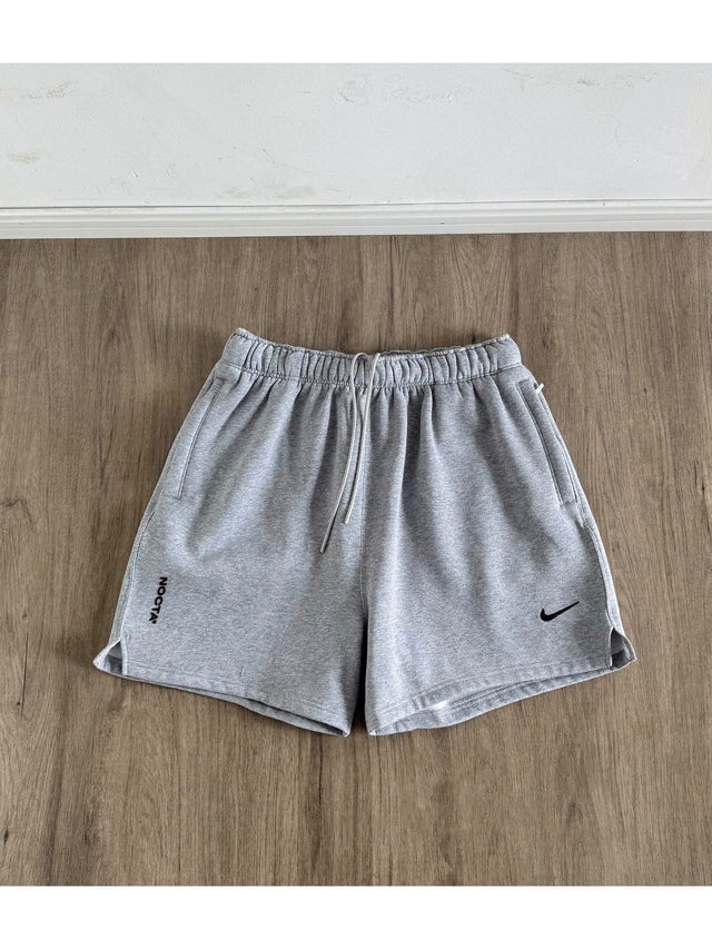 Short Nike gris