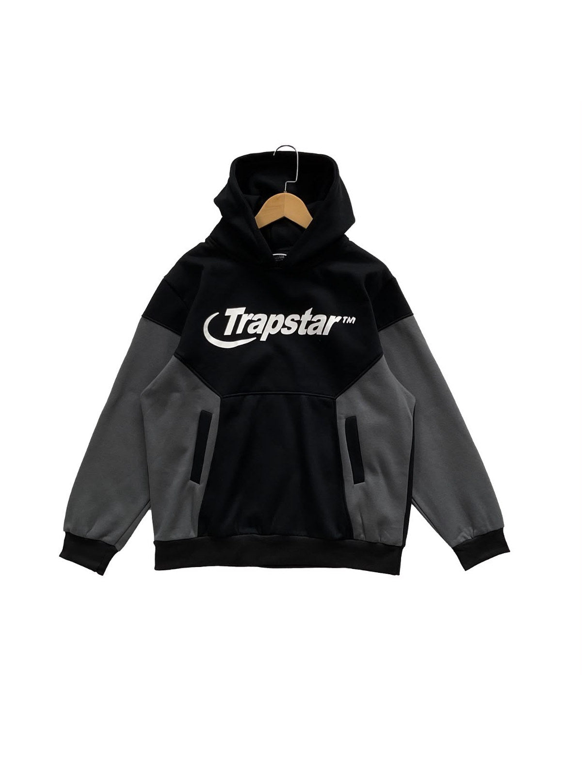Buzo Trapstar bicolor negro y gris