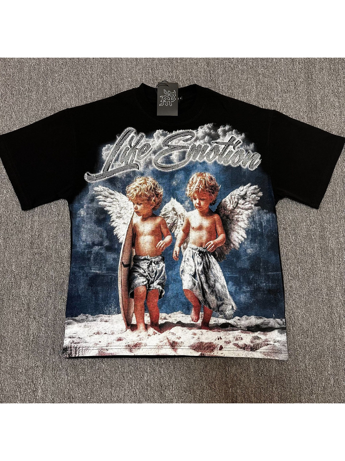 Remera negra con dos �ngeles en la nieve � Mixed Emotion | Mixed Emotion