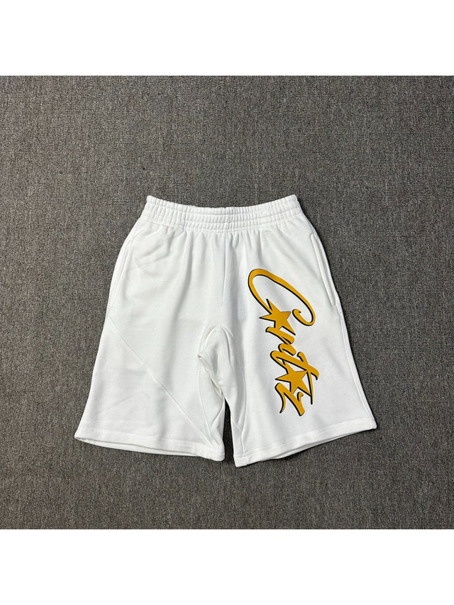 Short blanco con inscripci�n amarilla � Corteiz | Corteiz