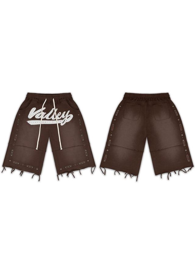 Bermuda marr�n desflecada con logo blanco � Valley | Valley