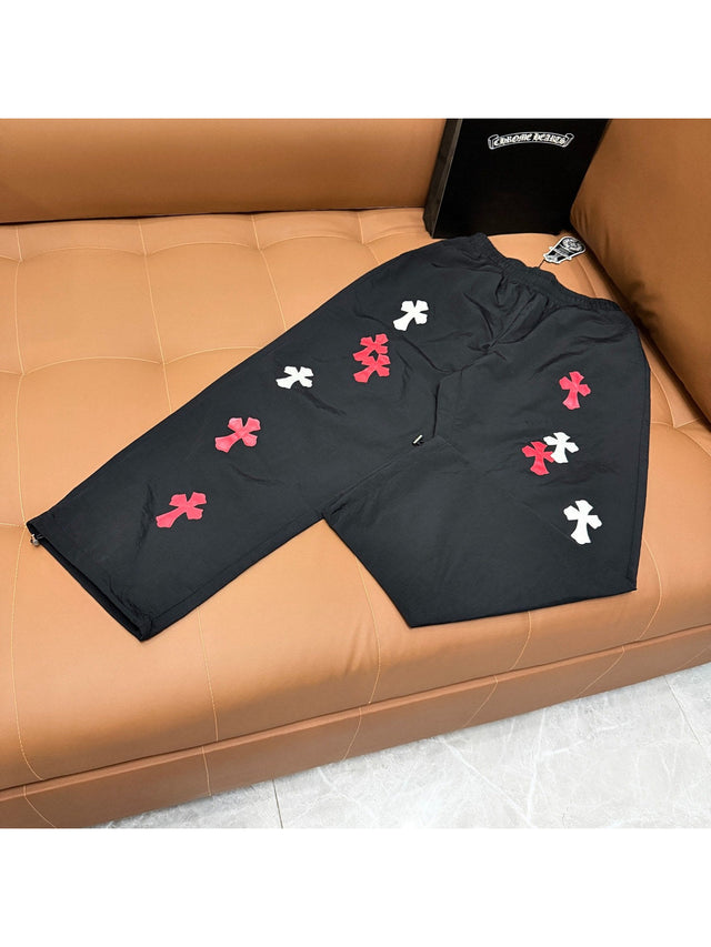 Pantal�n negro con cruces rojas y blancas | Chrome Hearts