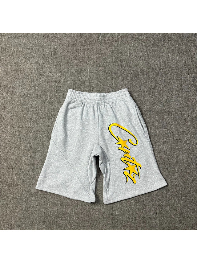 Short gris con logo amarillo | Corteiz