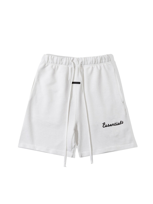 Short Essentials blanco con logo cursivo | Essentials