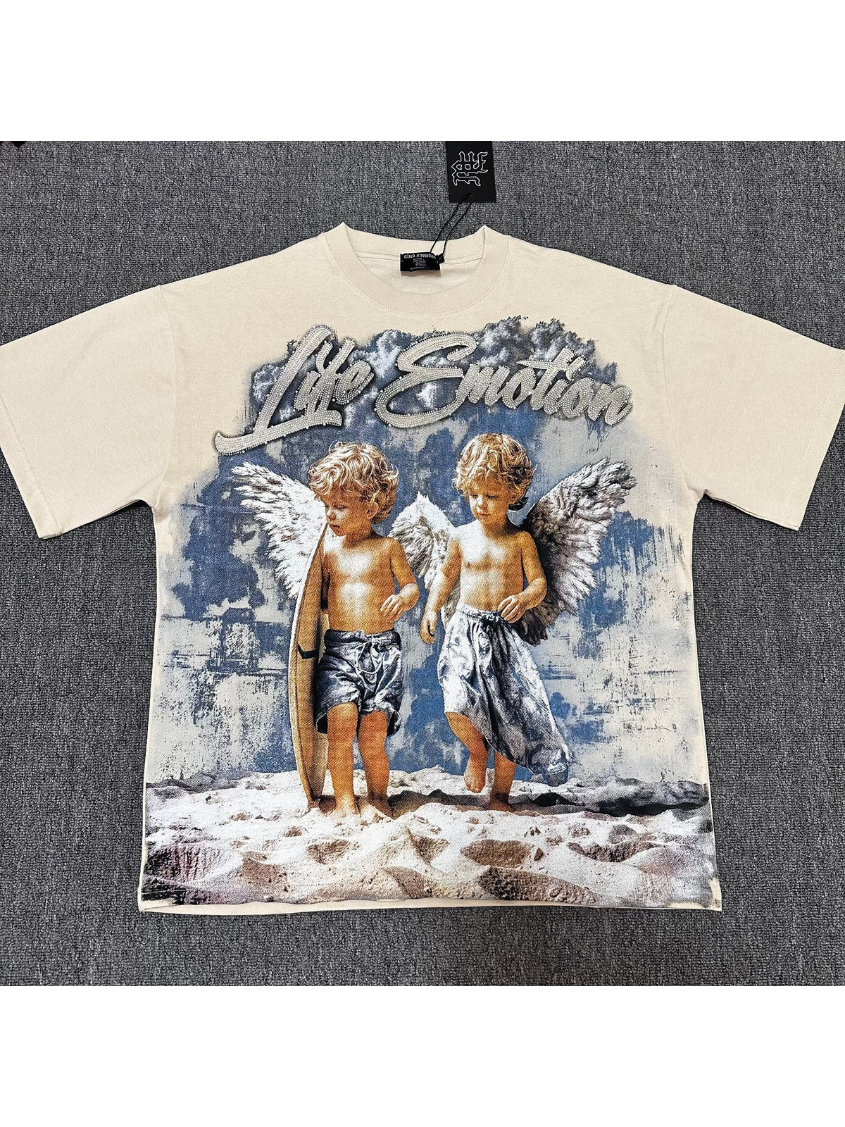 Remera crema con dos �ngeles en la nieve � Mixed Emotion | Mixed Emotion