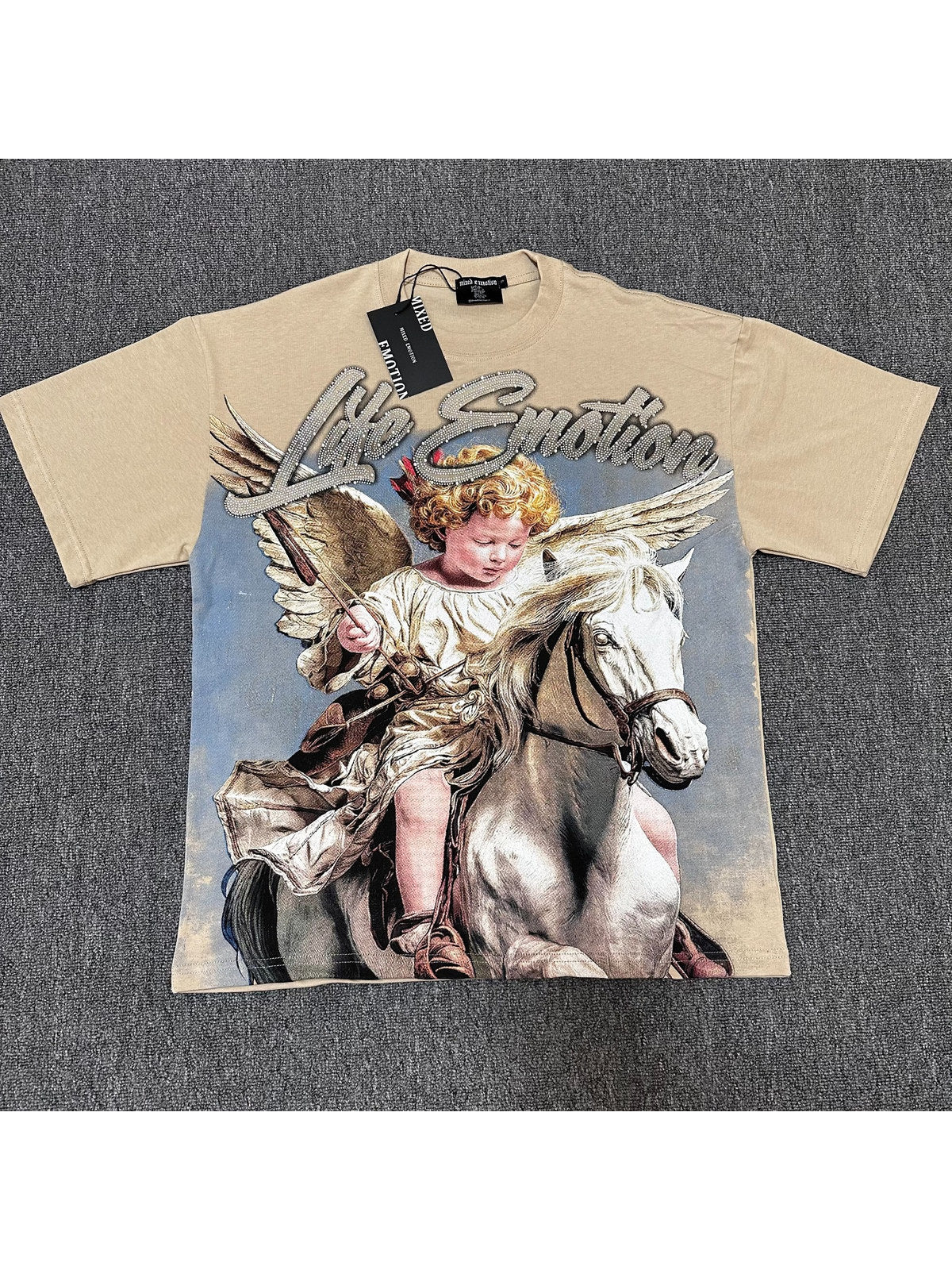 Remera crema con ángel a caballo · Mixed Emotion | Mixed Emotion